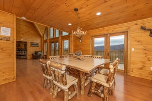 Dining room with table for 8 at Js Hideaway, a 4 bedroom cabin rental located in Pigeon Forge