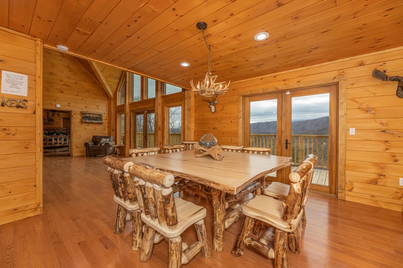 Dining room with table for 8 at Js Hideaway, a 4 bedroom cabin rental located in Pigeon Forge