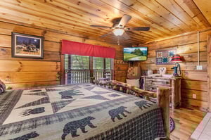 King bed facing dresser and tv