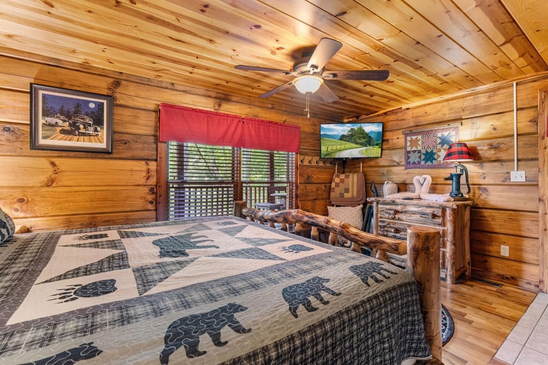 King bed facing dresser and tv