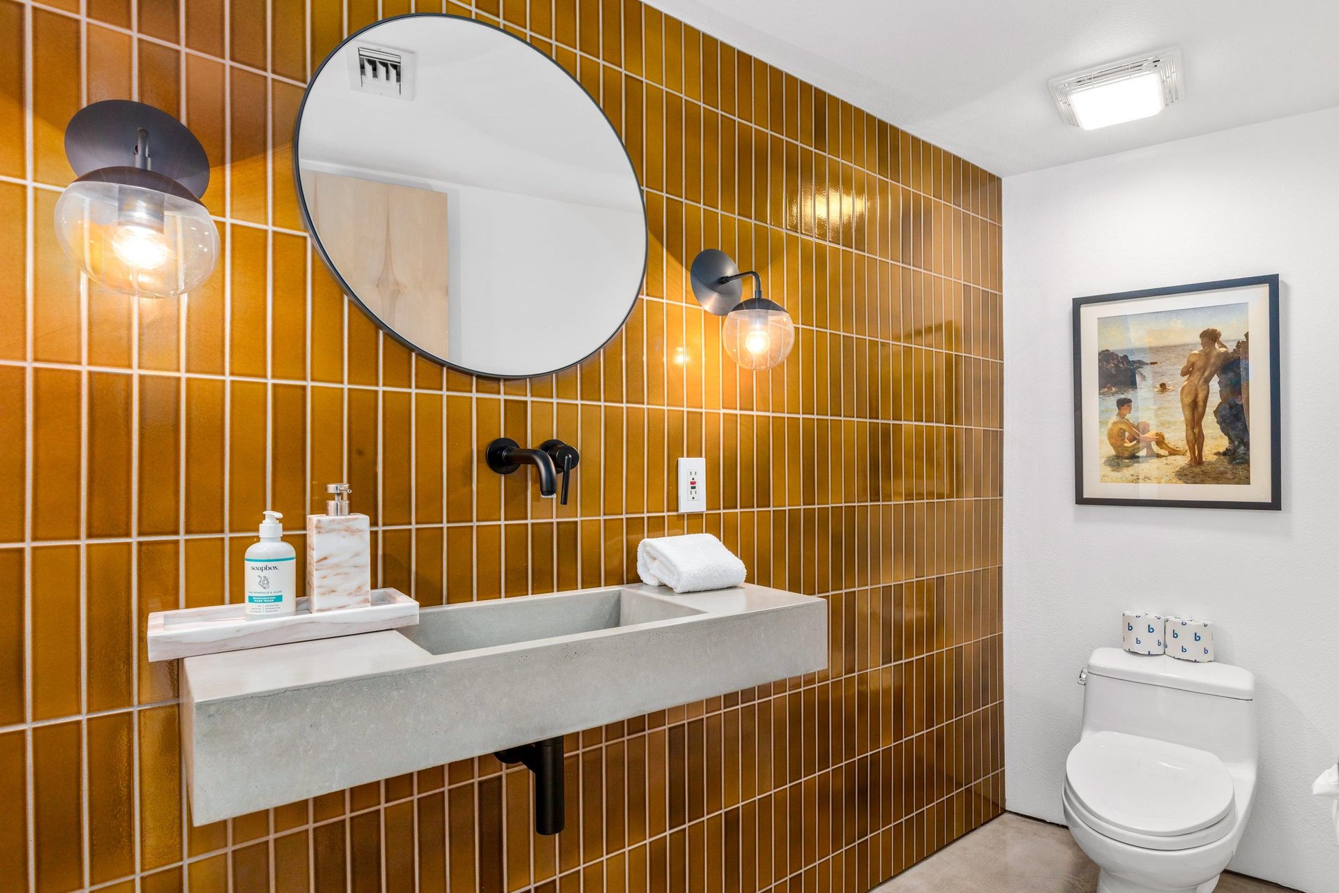 Beautifully tiled guest bathroom.
