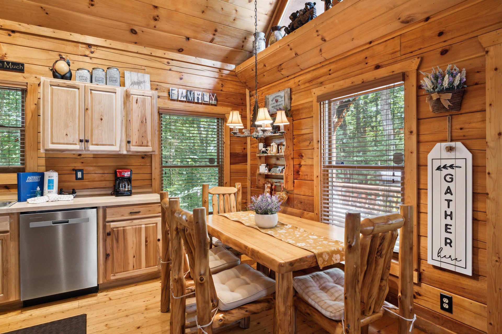dining table and chairs by windows
