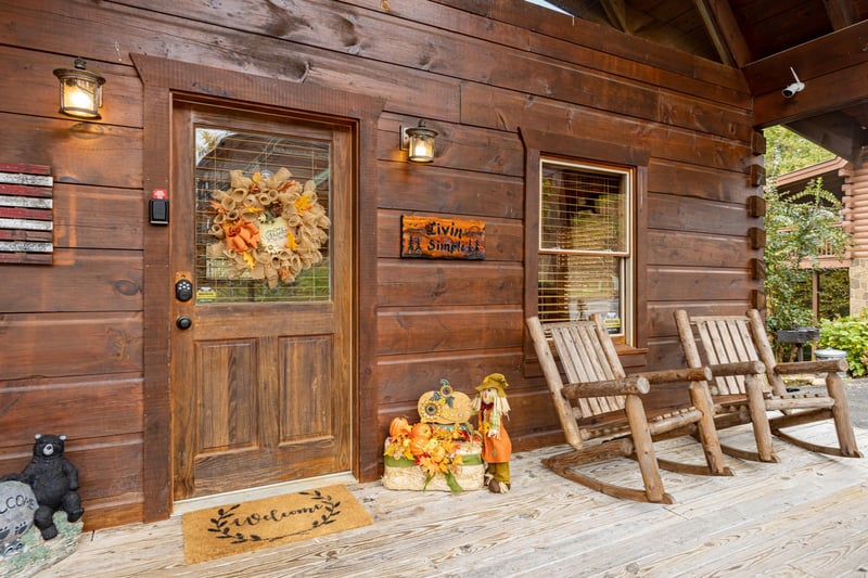 Front door and porch at Livin Simple, a 2 bedroom cabin rental located in Pigeon Forge