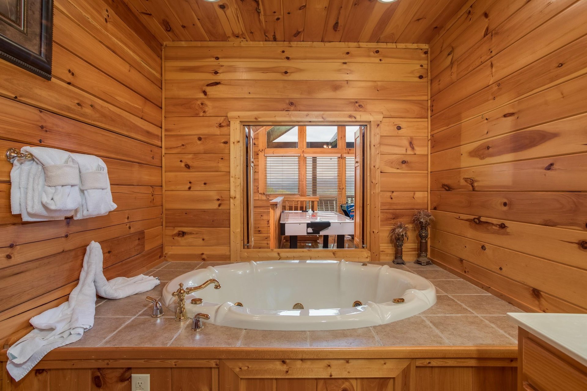 Jacuzzi in the second floor bathroom at Howlin in the Smokies, a 2 bedroom cabin rental located in Pigeon Forge