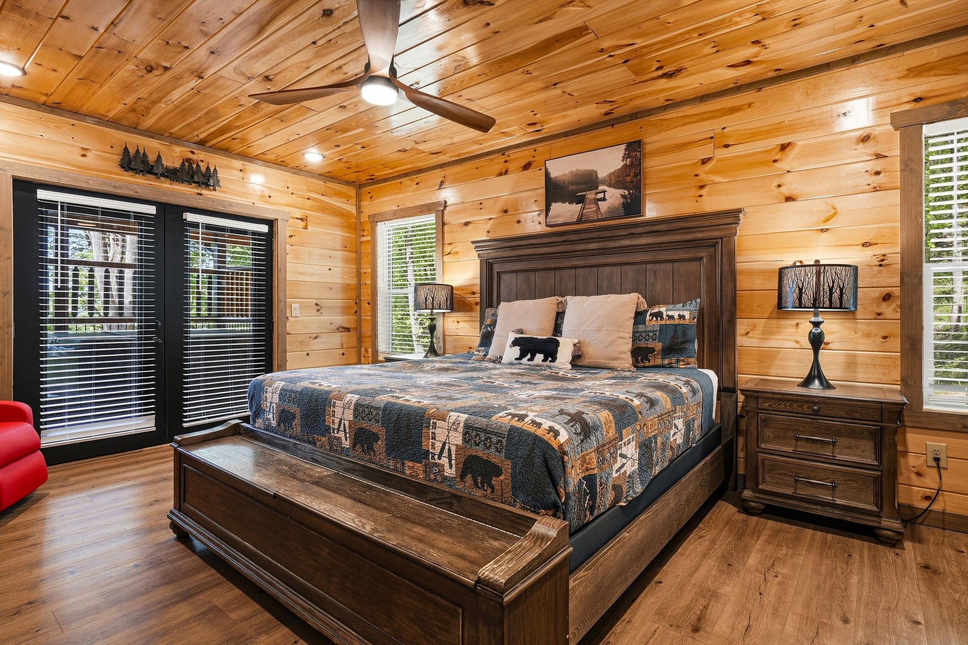 Rest peacefully in your rustic cabin bedroom with warm wood walls, comfortable bedding, and naturethemed decor that creates the perfect mountain retreat atmosphere.