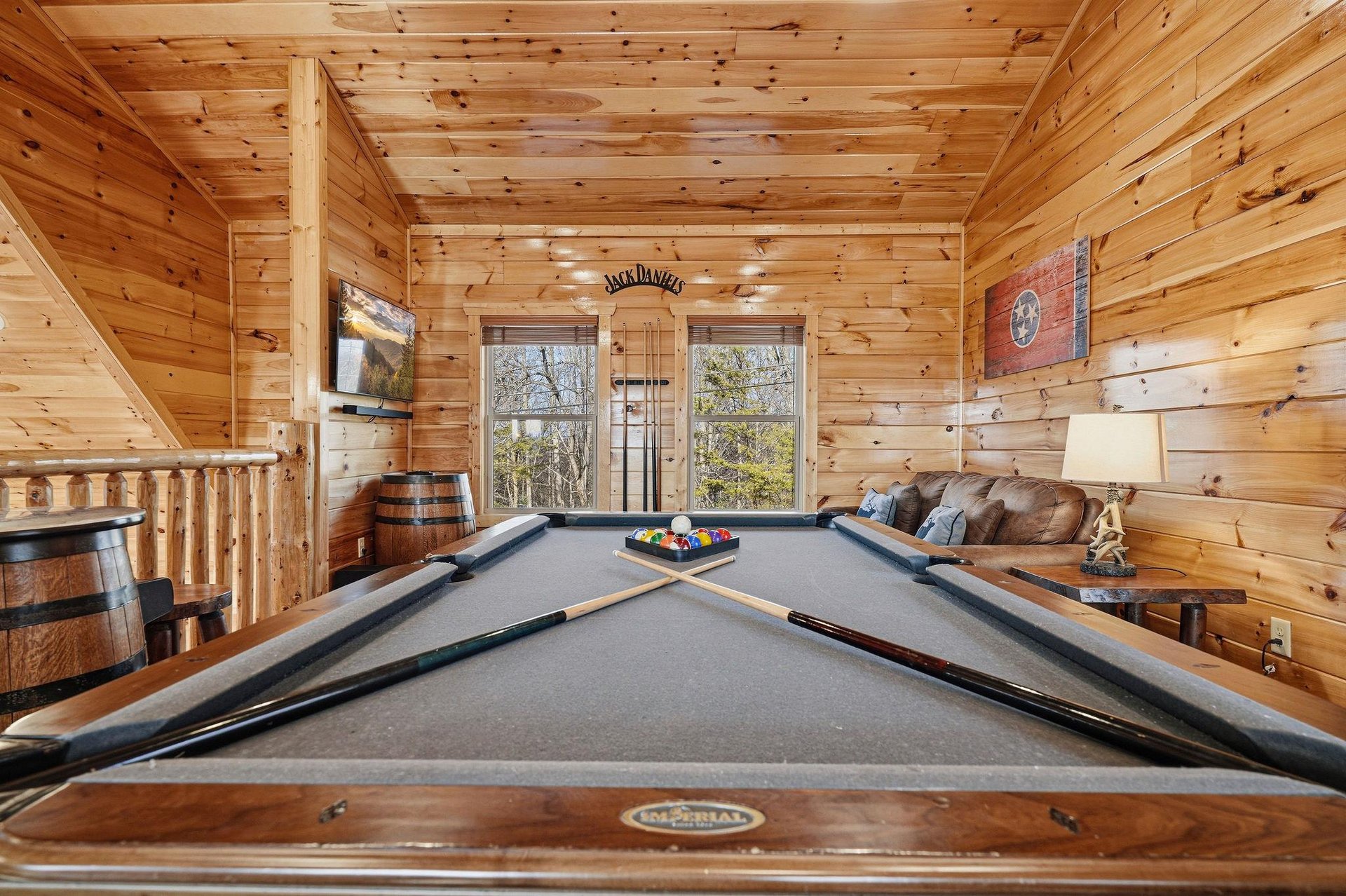 Challenge friends to pool in your cozy game room, surrounded by warm wood and mountain views through the windows.