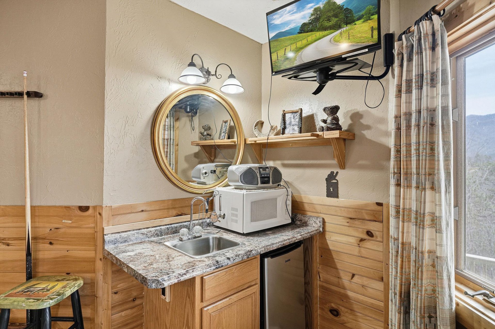 Your cozy mountain kitchenette combines rustic charm with modern convenience, featuring granite counters and scenic valley views.