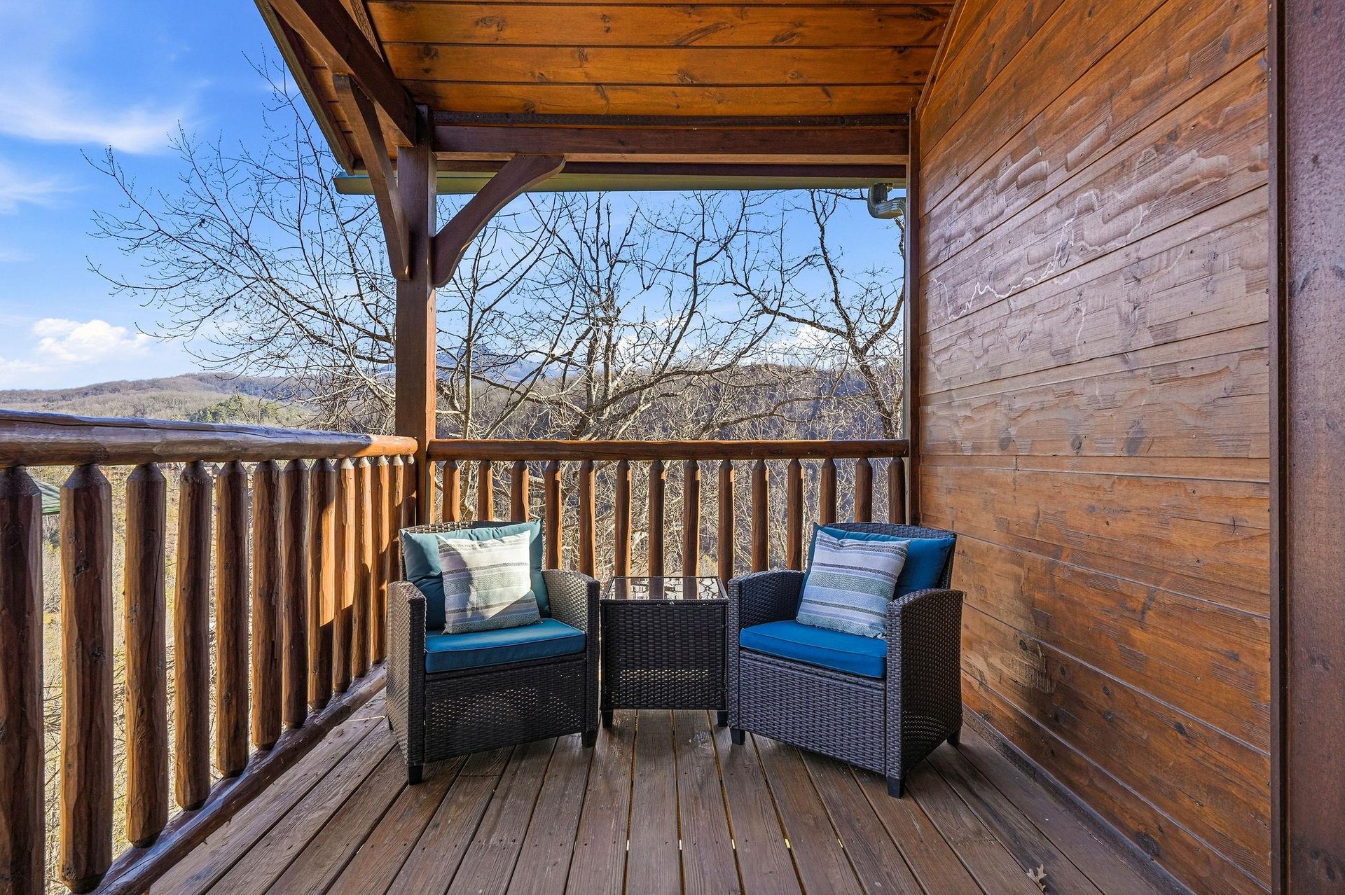 Unwind on your private balcony with comfortable seating and breathtaking mountain views stretching endlessly before you.