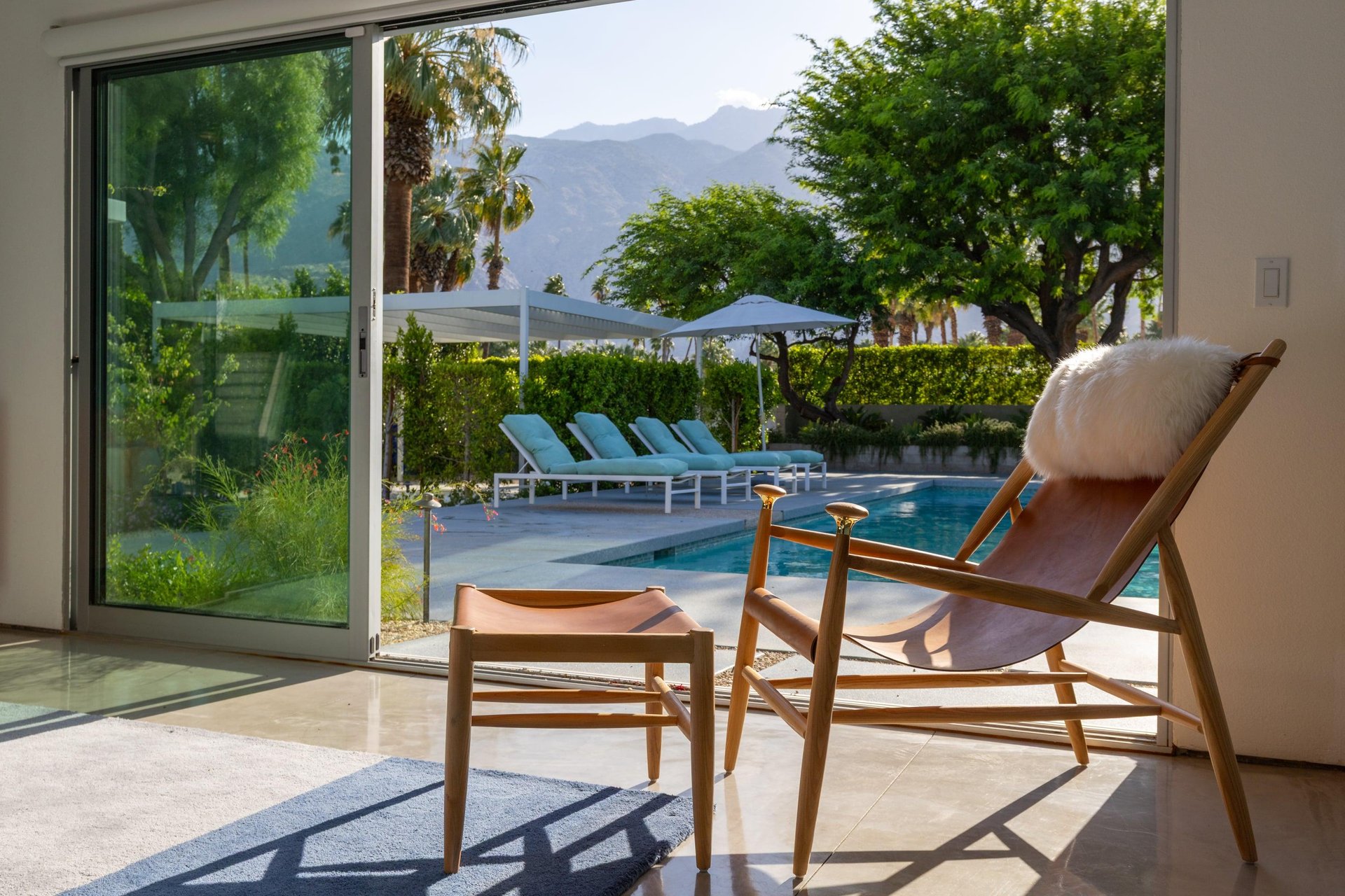Features a king size bed, large sliding doors to poolspa and patio, ensuite bathroom, and smart TV.