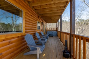 Deck with adirondack chairs at Everlys Splash, a 4 bedroom cabin rental located in Pigeon Forge