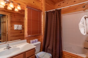 Bathroom with a tub and shower at Four Seasons Lodge, a 3bedroom cabin rental located in Pigeon Forge