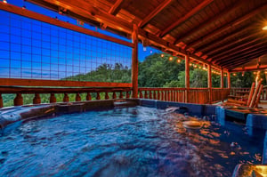 Soak away your cares in your private hot tub as twilight settles over the treetops, the perfect end to any mountain day.