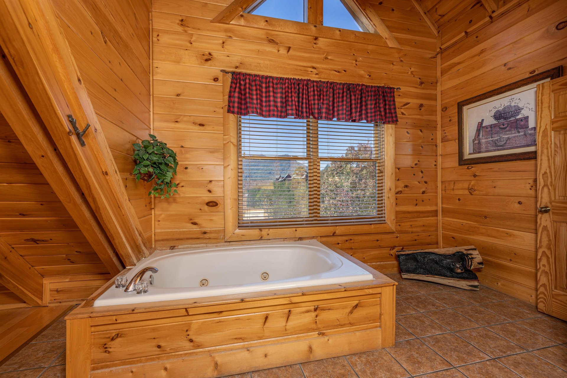 Jacuzzi in a bedroom at Bears Dont Bluff, a 3 bedroom cabin rental located in Pigeon Forge
