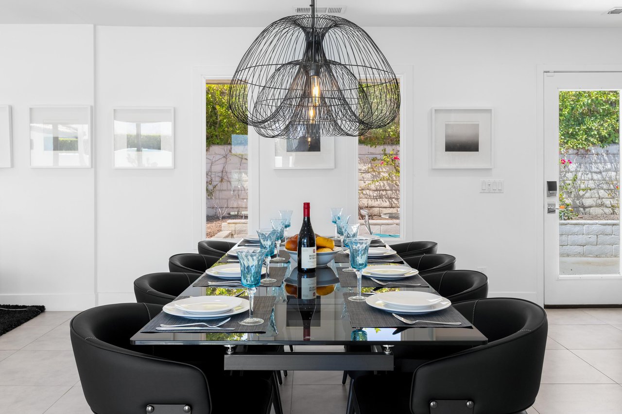 Large table with seating for 8 guests.