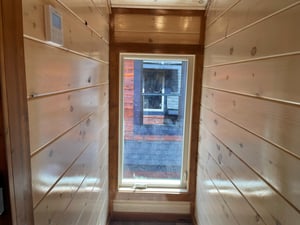 Step into your private wooden sauna where warm cedar walls and gentle natural light create the perfect space for relaxation and rejuvenation.