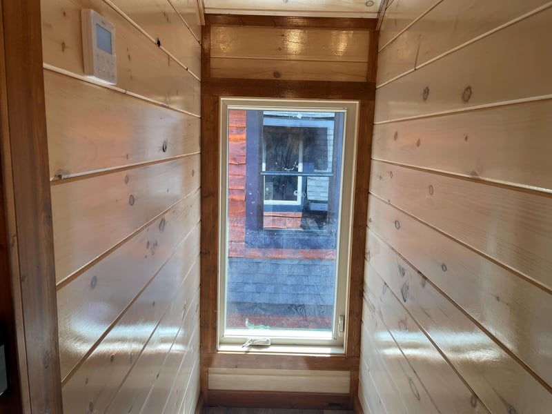 Step into your private wooden sauna where warm cedar walls and gentle natural light create the perfect space for relaxation and rejuvenation.