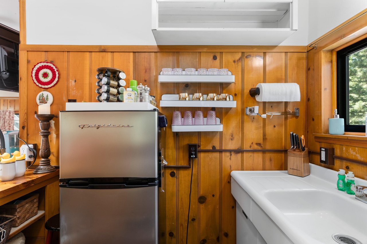 Full size kitchen located next to the sleeping area.