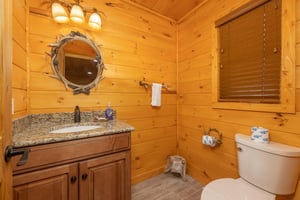 Half bath at Js Hideaway, a 4 bedroom cabin rental located in Pigeon Forge