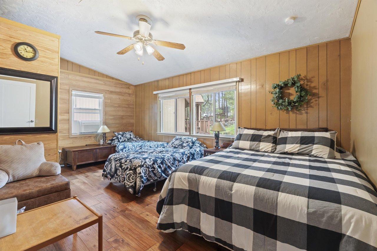 Two twin size beds and one queen size bed.