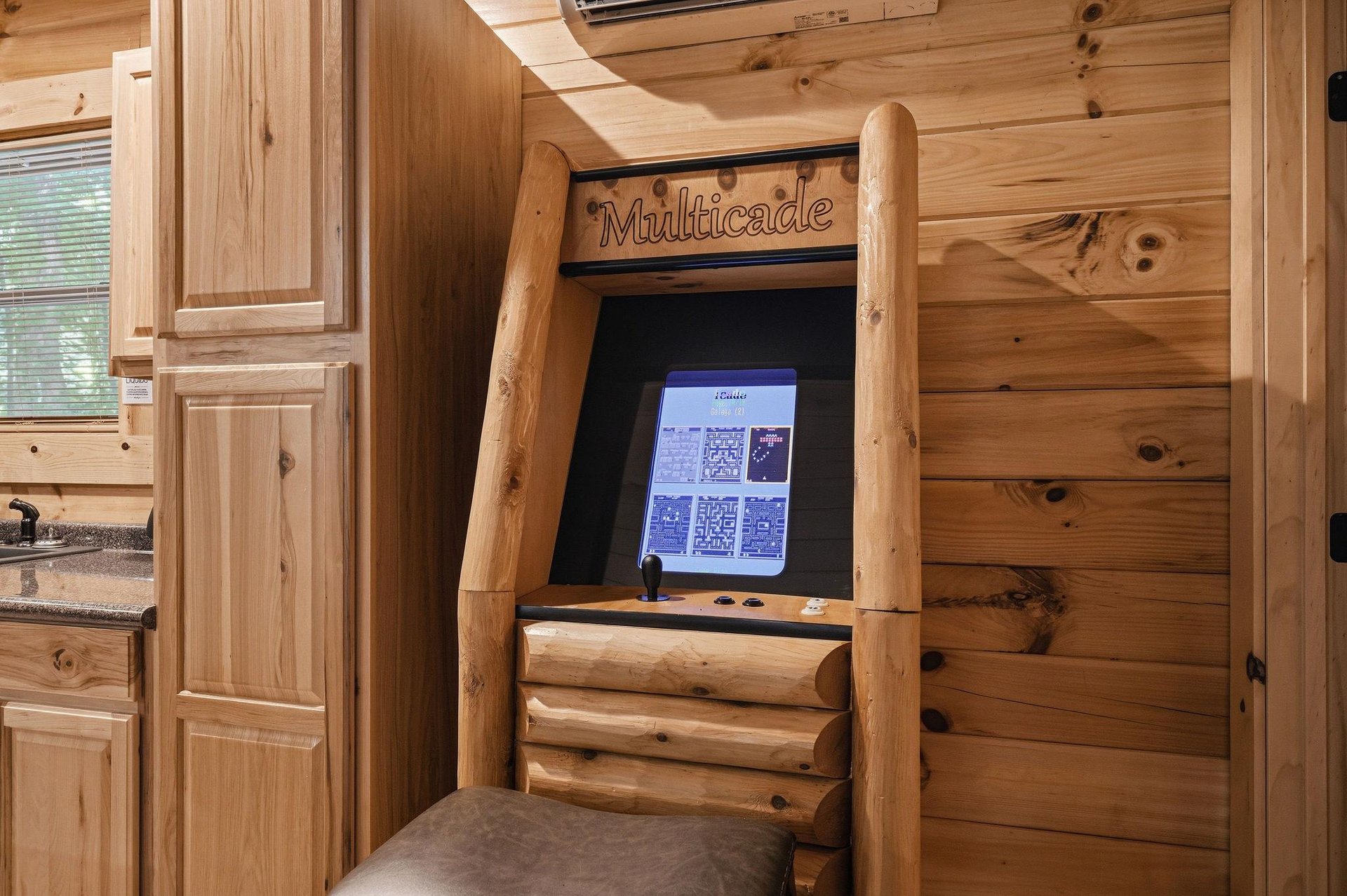 Relive classic gaming memories at this custombuilt arcade in natural wood, complete with nostalgic favorites to keep you entertained during your stay.
