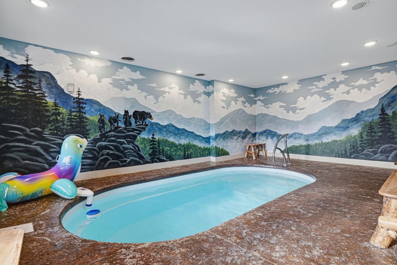 Your private indoor pool awaits, surrounded by stunning mountain murals that transport you to natures embrace while you swim and relax.