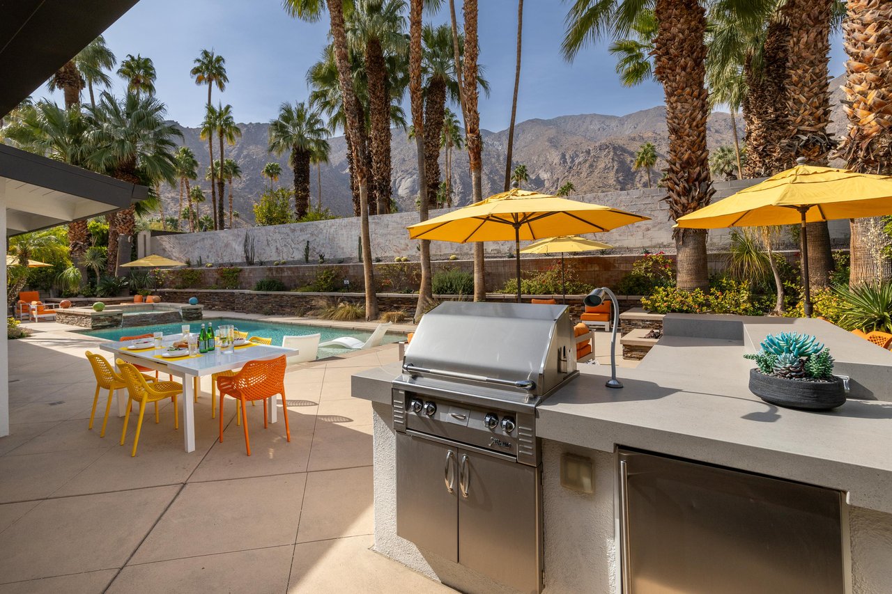 Enjoy cooking at the BBQ with these mountain views