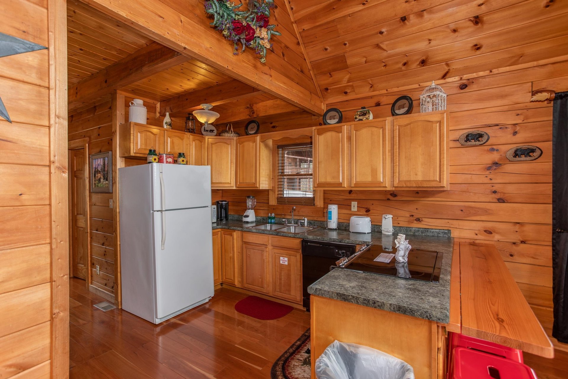 Fully equipped kitchen at Hibernation Station, a 3bedroom cabin rental located in Pigeon Forge
