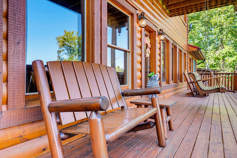 Settle into handcrafted wooden chairs on your private deck and breathe in the fresh forest air as sunlight filters through the trees.