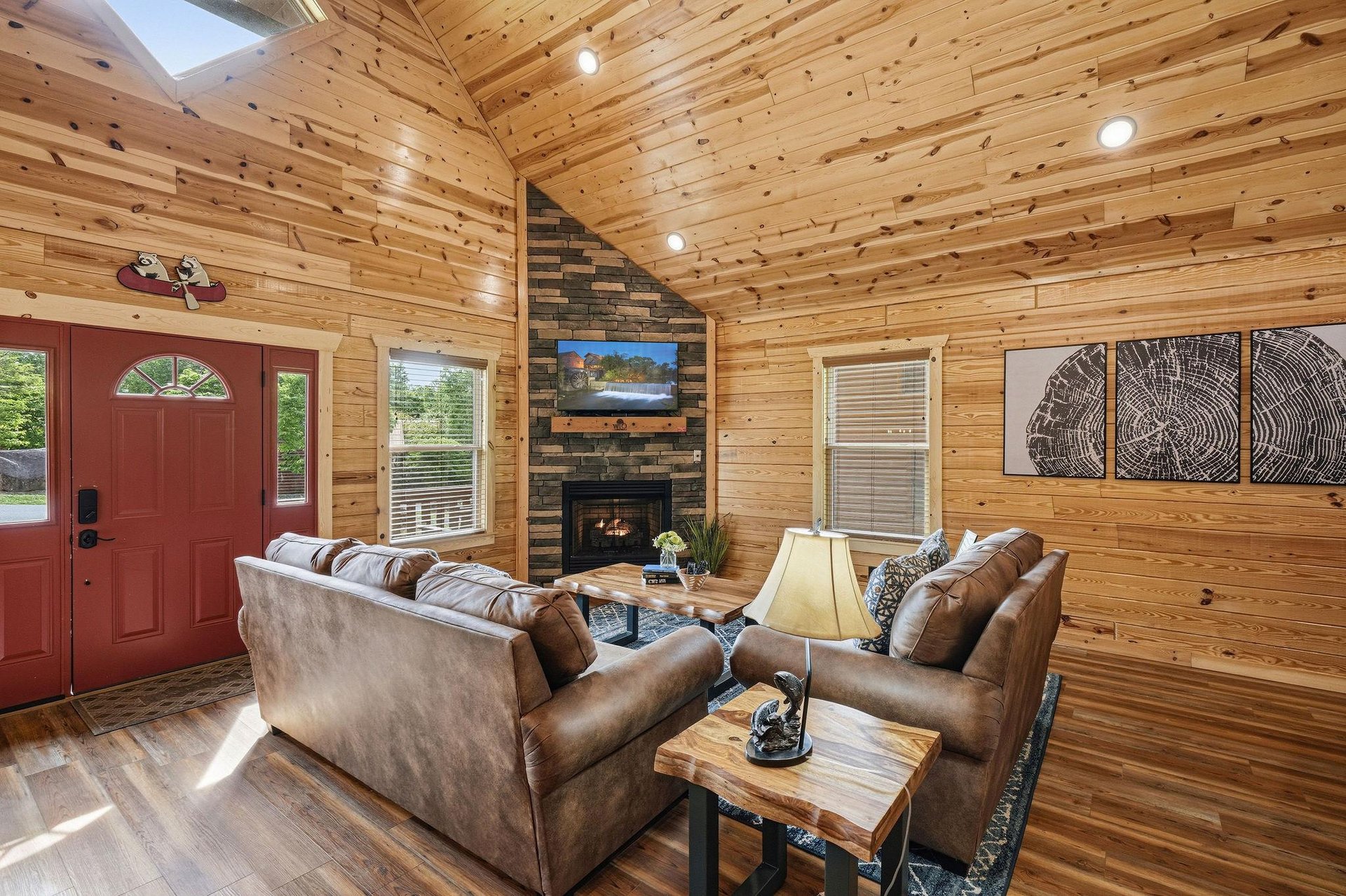 Sink into plush leather sofas by the crackling fireplace and admire stunning woodwork throughout your bright, airy living space. Perfect for unwinding after your mountain adventures.