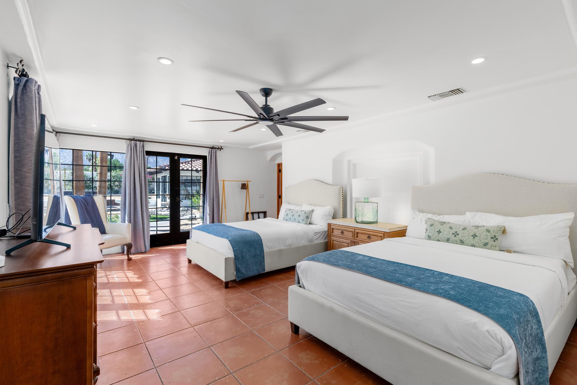 Primary bedroom with two queen beds