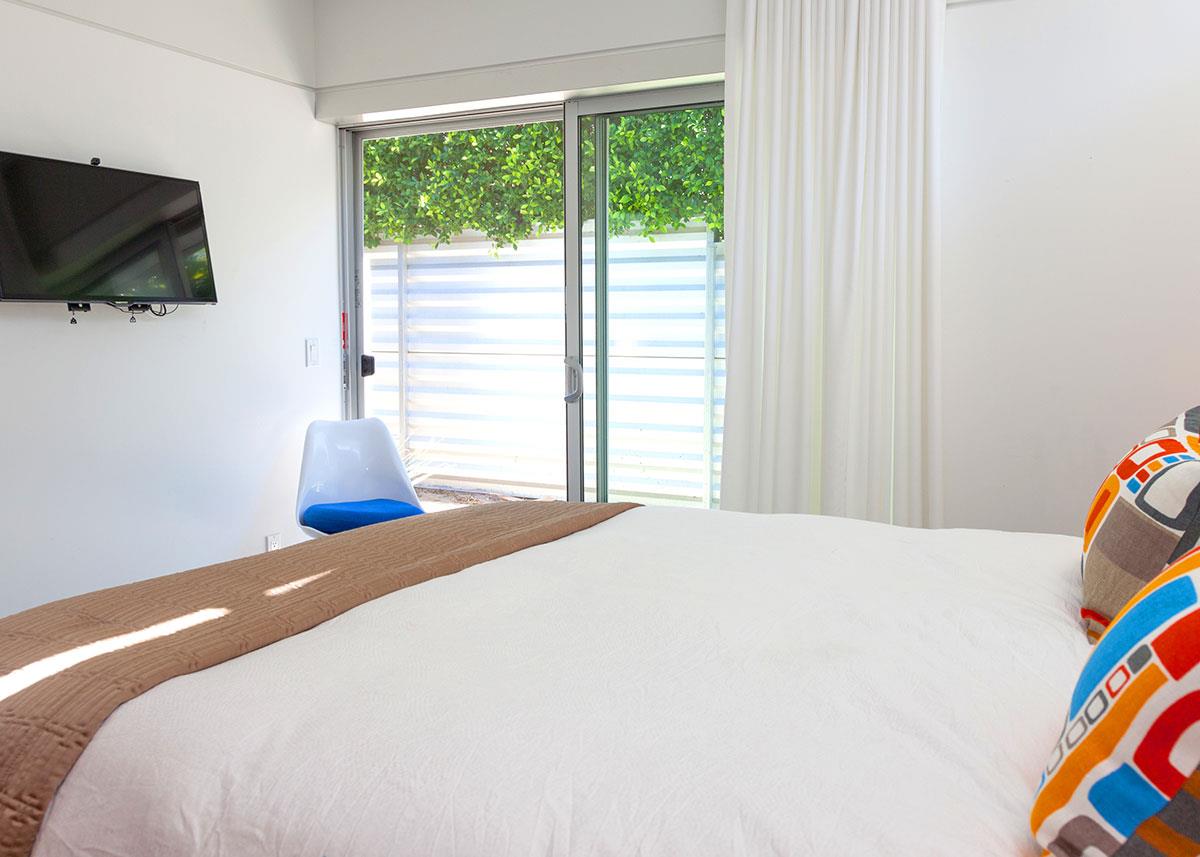 A gorgeous bedroom with outdoor access