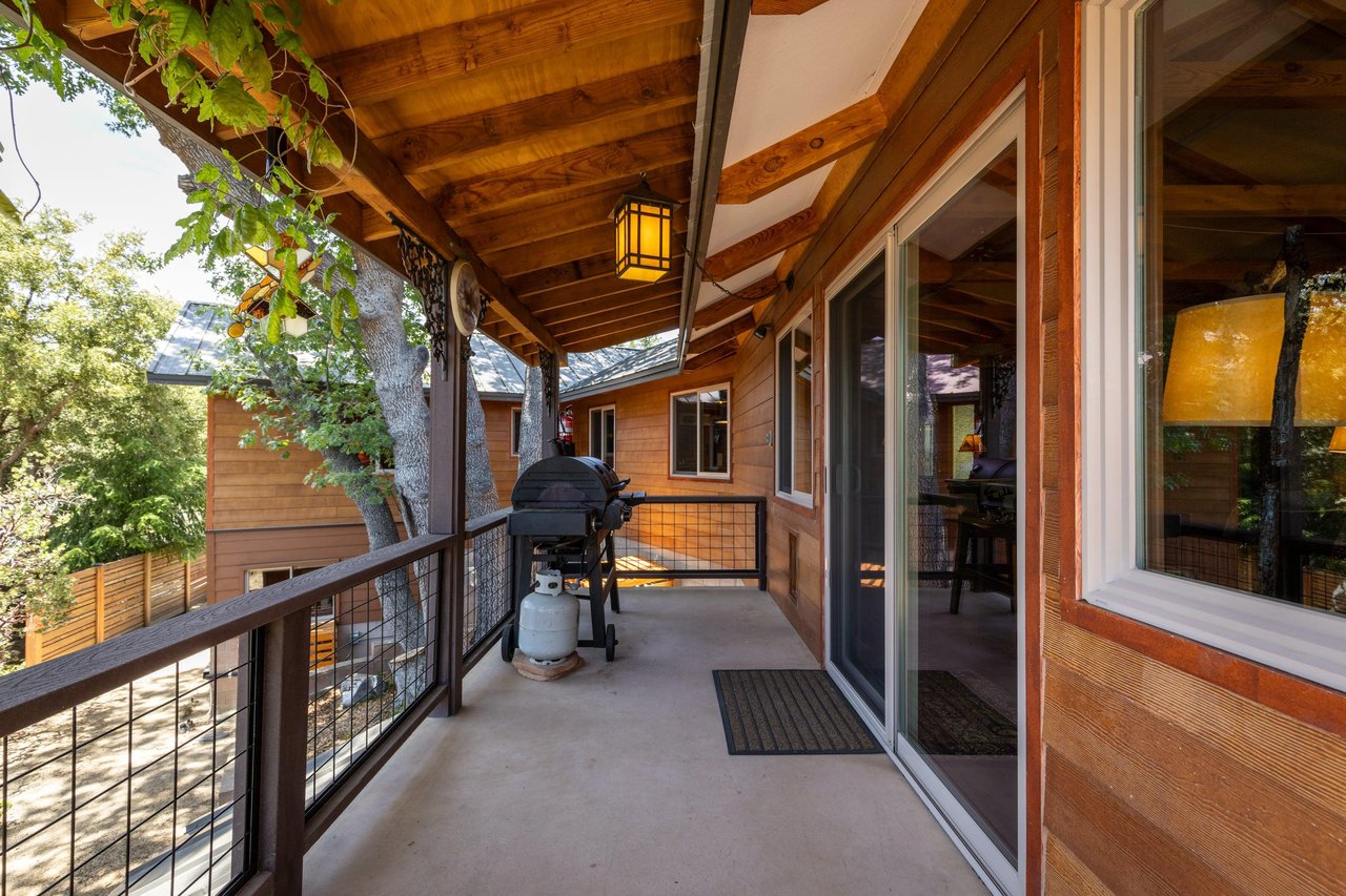 BBQ located on the side of the home, just off of the living room and reading nook.