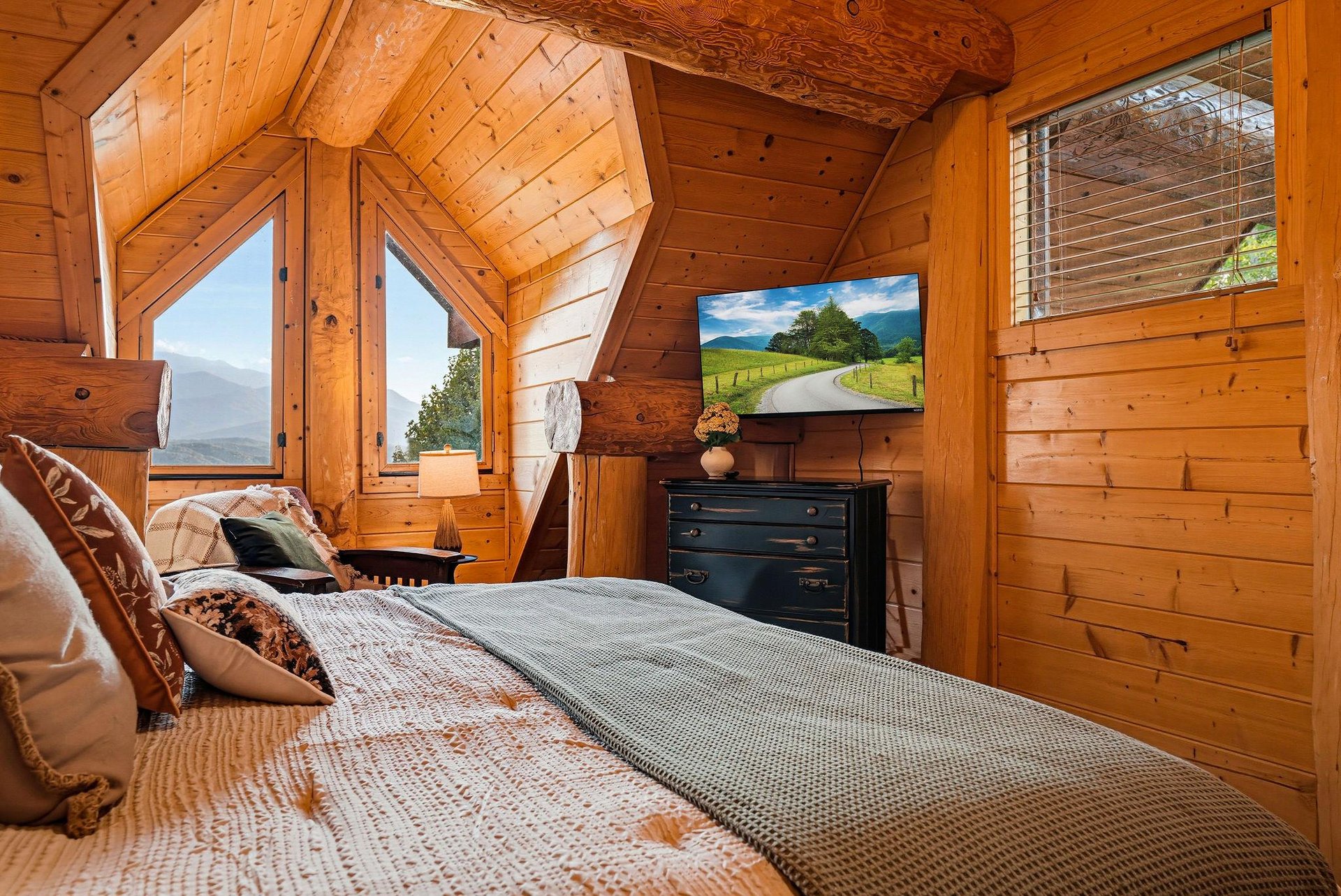 Wake up in your own timberframed retreat with sweeping mountain views through rustic windows. The handcarved wood beams and soft linens invite pure relaxation.