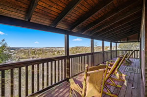 Your private deck offers panoramic views and cozy seating where you can unwind while taking in the stunning landscape stretching endlessly before you.