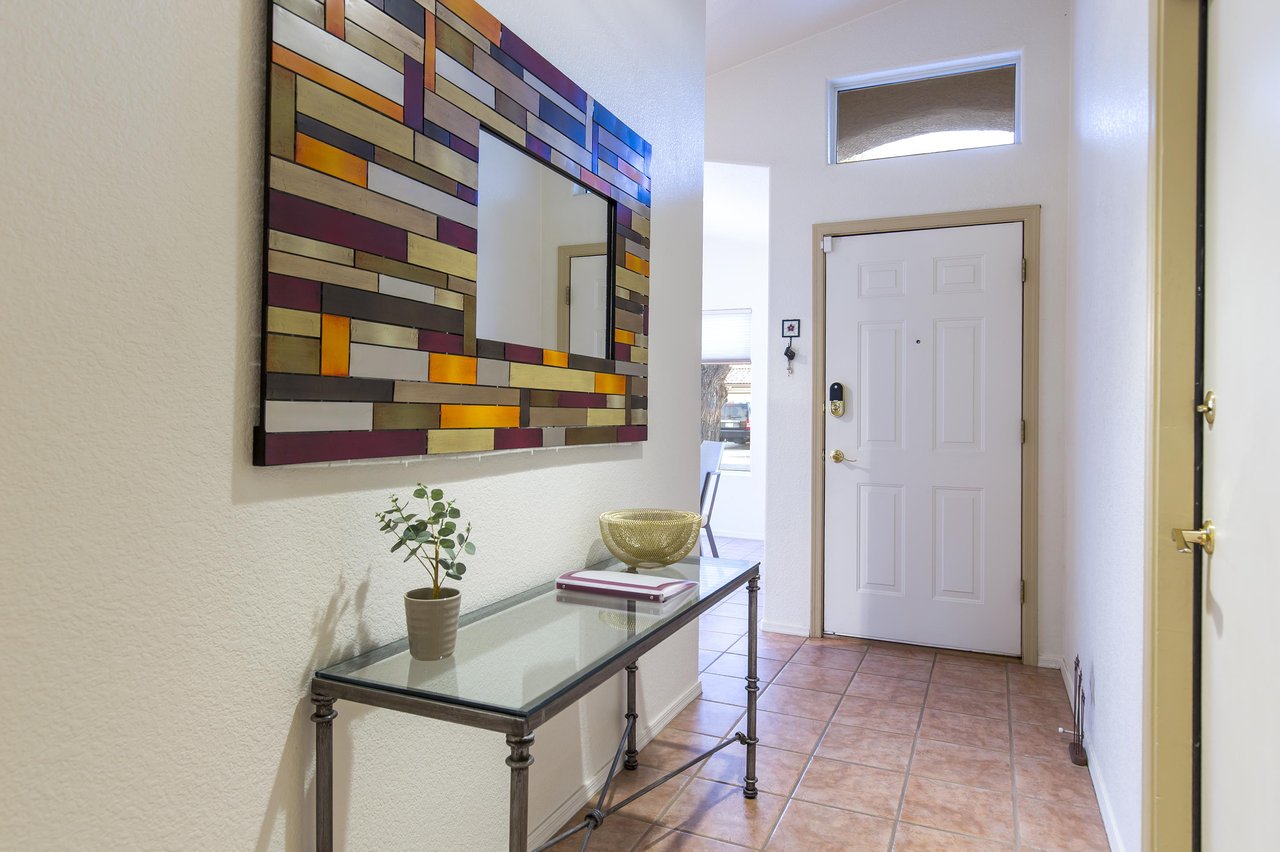 View of front door and entryway into the home