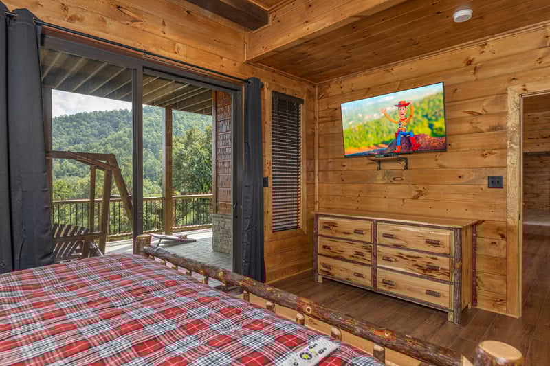 Dresser, TV, and deck access