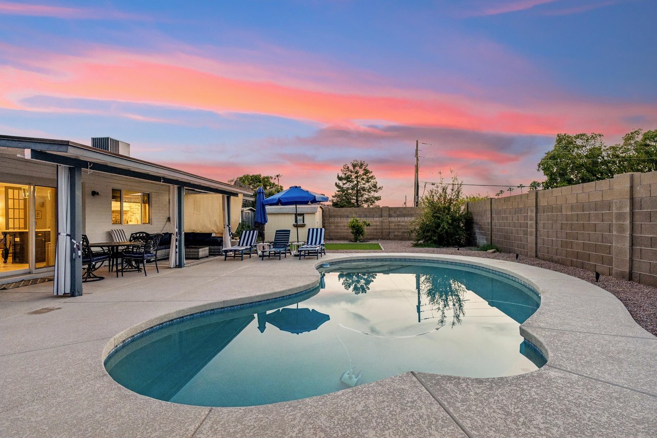 Private pool, patio area, and outdoor seating.