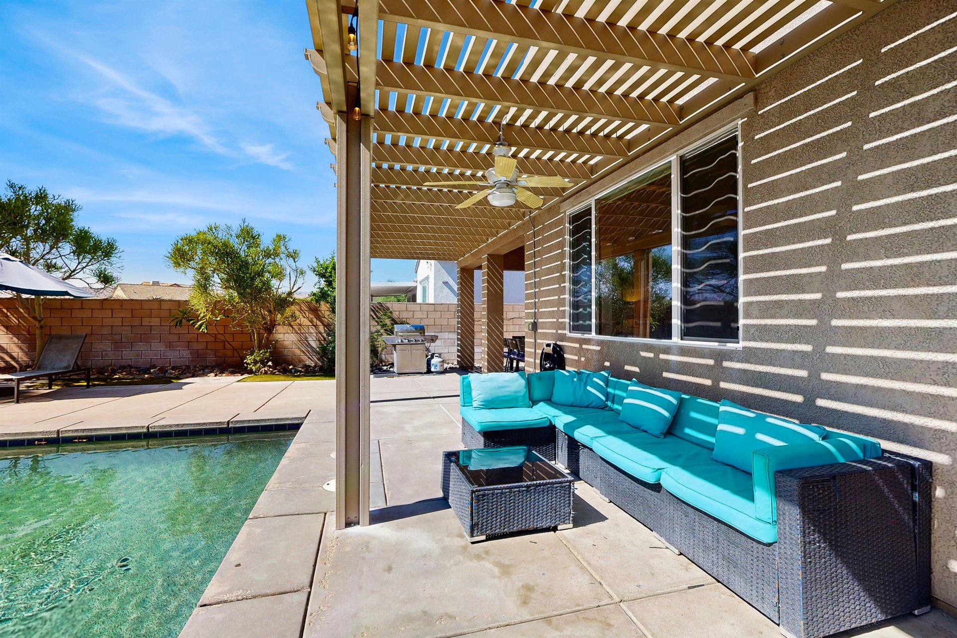 Outdoor seating and outdoor ceiling fan.
