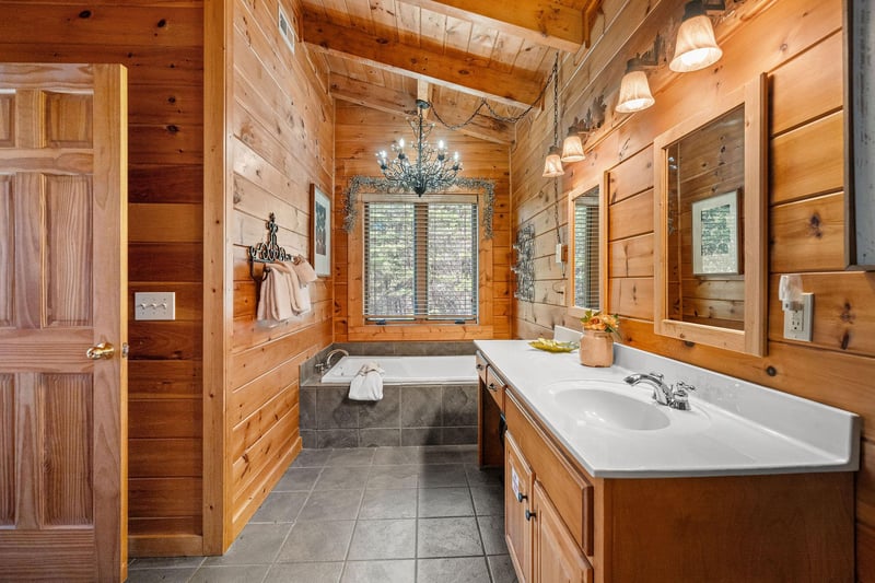 Jacuzzi in a bathroom at Mountain Mama, a 3 bedroom cabin rental located in Pigeon Forge