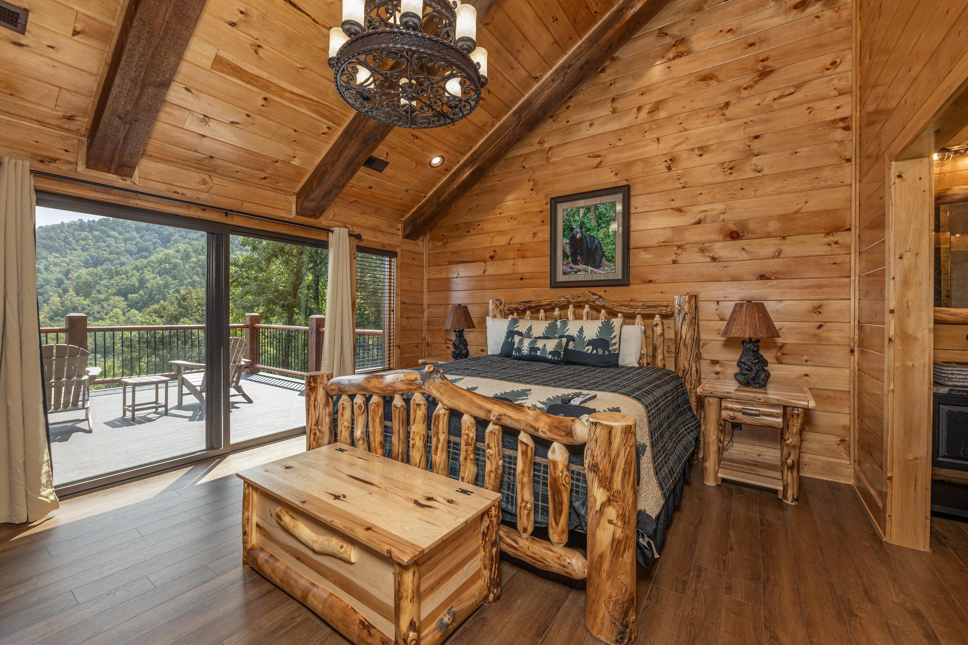 Bedroom with a king log bed