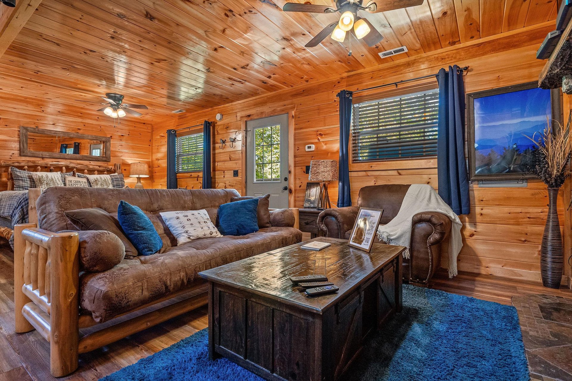 Living room with blue rug