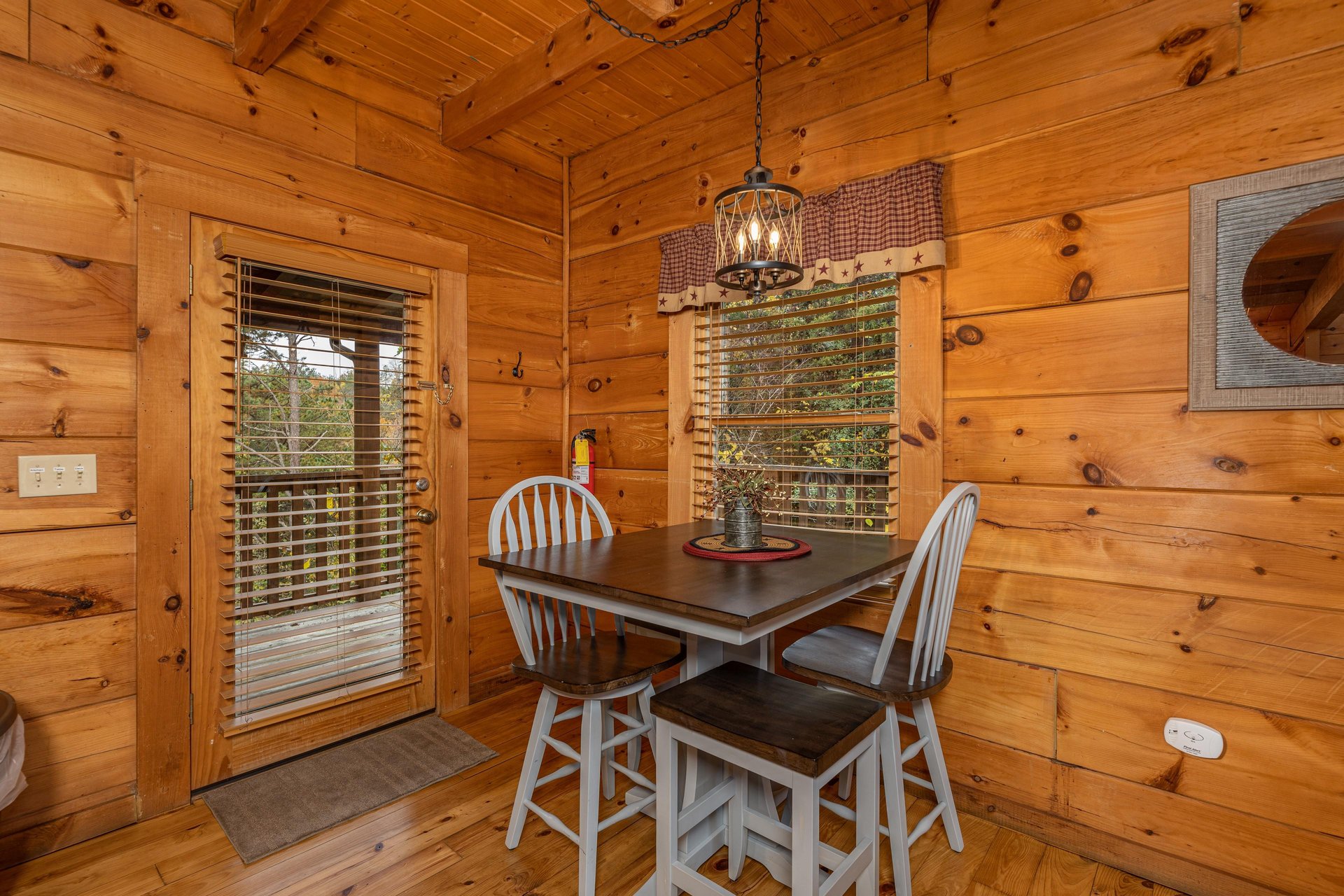 Dining table for four at Livin Simple, a 2 bedroom cabin rental located in Pigeon Forge
