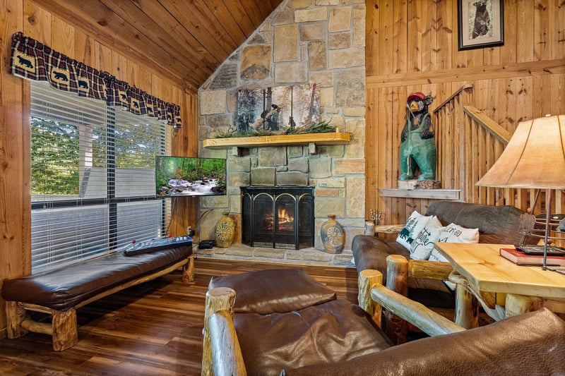 Living room with stone fireplace