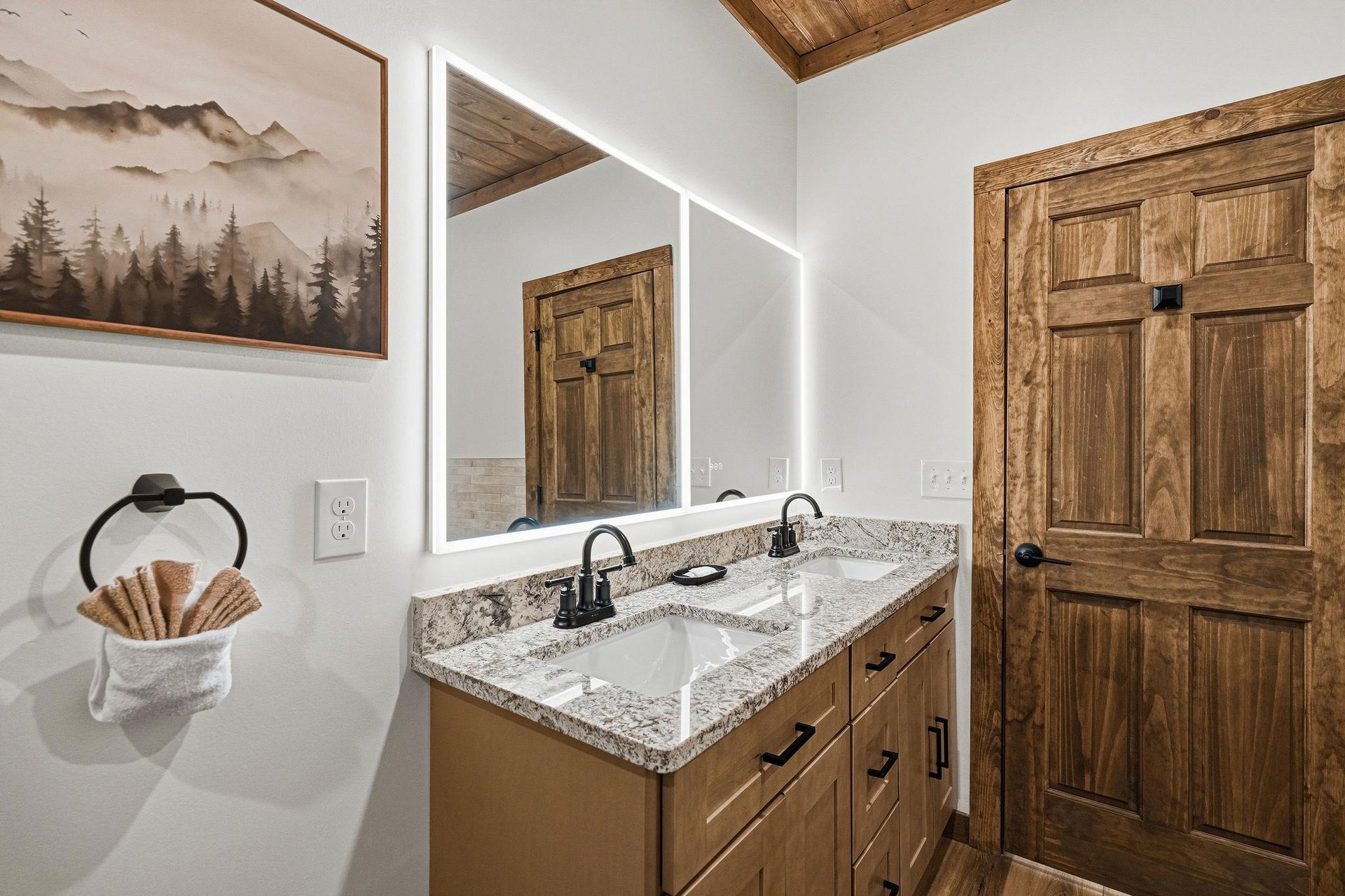 Refresh in your beautifully appointed bathroom with granite countertops, dual sinks, and rustic mountain charm.