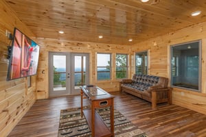 Foosball table with futon and tv