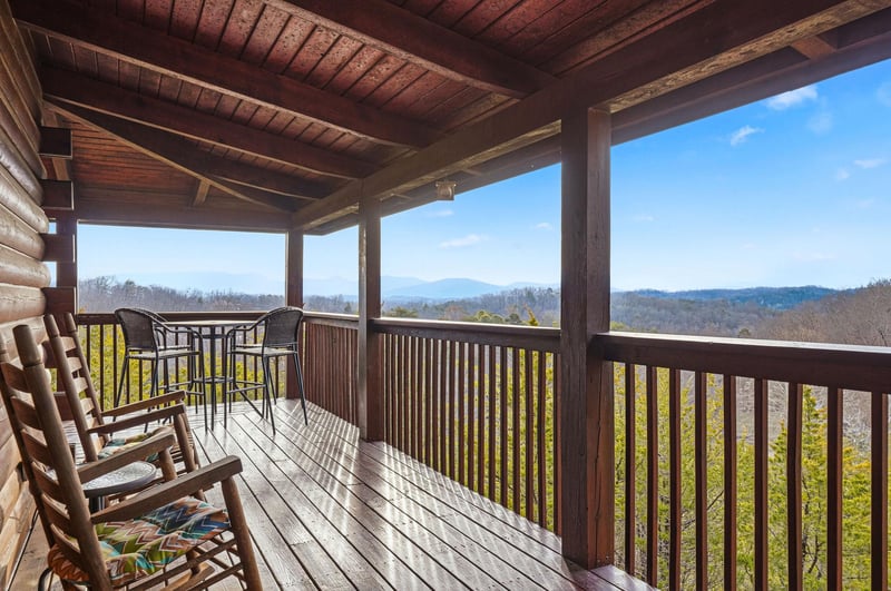 Relax on your private covered deck with stunning mountain views, perfect for morning coffee or evening unwind.