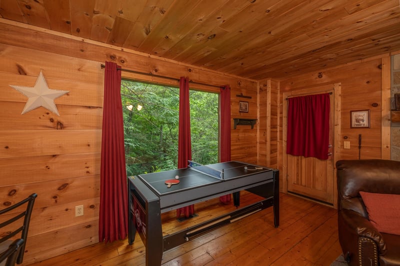 Ping pong table at Logans Smoky Den, a 2 bedroom cabin rental located in Pigeon Forge