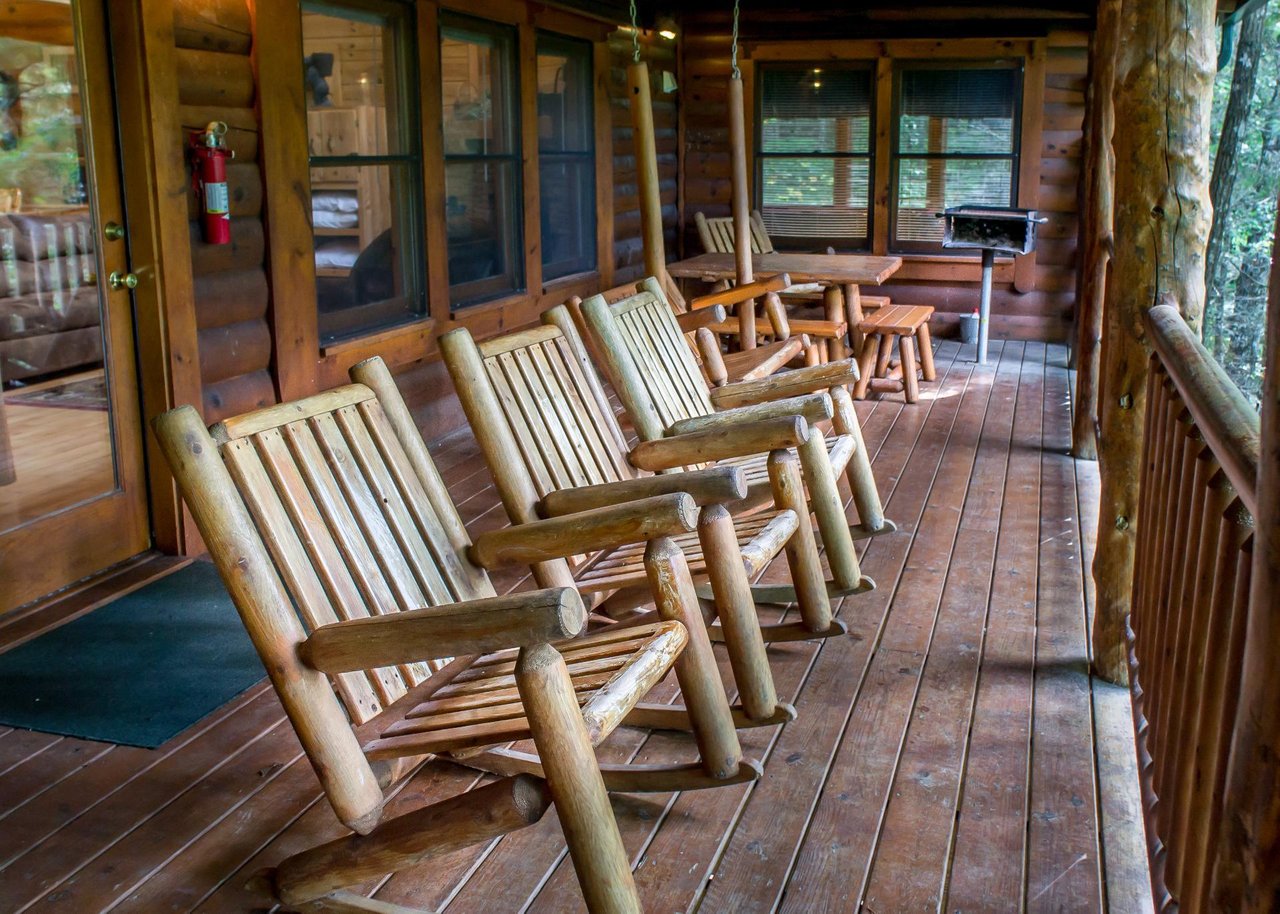 Step outside to the deck, which includes a hot tub, propane grill, picnic table and rocking chairs, perfect for enjoying the fresh mountain air and scenic surroundings.