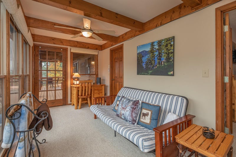 Futon and computer desk off the bedroom at Lazy Bear Retreat, a 4 bedroom cabin rental located in Pigeon Forge