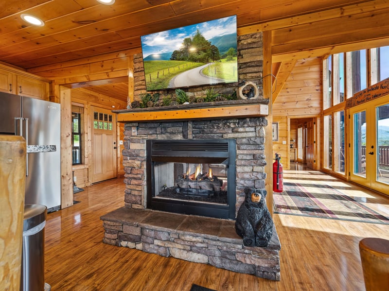 Fireplace with tv and bear statue